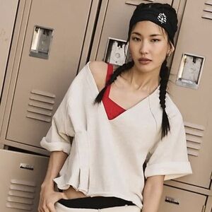 FREE PEOPLE MOVEMENT FOR THE WIN 
V NECK TEE SWEATSHIRT SIZE MEDIUM 
TOP